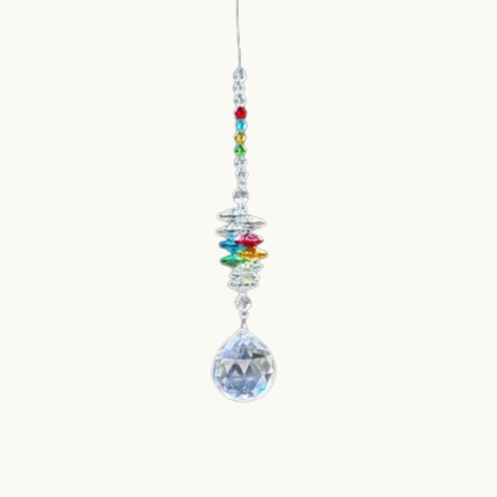 Crystal Chakra Sun Catcher with many colours of crystal shown against a white background
